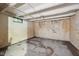 Basement interior with cinder block walls and painted floor at 5035 Boulevard Pl, Indianapolis, IN 46208