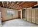 This fixer-upper bedroom has potential, with closet, window, and adjacent room, ready for transformation at 5035 Boulevard Pl, Indianapolis, IN 46208