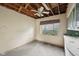 Kitchen/dining area with ample natural light and exposed ceiling beams at 5035 Boulevard Pl, Indianapolis, IN 46208