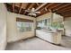 Retro kitchen with lots of windows, vintage cabinetry, and an open ceiling at 5035 Boulevard Pl, Indianapolis, IN 46208