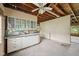 View of a retro-style kitchen and an adjacent dining area at 5035 Boulevard Pl, Indianapolis, IN 46208
