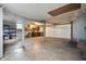 Large garage with workbench, storage shelves, and overhead door at 5092 S 50 W, Anderson, IN 46013