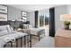 Comfortable bedroom featuring two twin beds, modern decor, and a bright window at 5925 Sterling Dr, Whitestown, IN 46075
