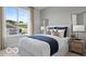 Serene bedroom featuring a cozy bed, soft lighting, and a scenic view at 5925 Sterling Dr, Whitestown, IN 46075