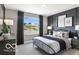 Stylish bedroom with black accent wall, modern furnishings, and ample natural light at 5925 Sterling Dr, Whitestown, IN 46075