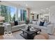 Bright, open-concept living room with large windows and modern neutral decor at 5925 Sterling Dr, Whitestown, IN 46075
