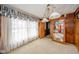 Bright bedroom featuring natural light and a display cabinet perfect for collectibles at 5939 Olivia Dr, Alexandria, IN 46001