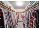 Walk-in closet with ample hanging space and shelving for organized storage at 5939 Olivia Dr, Alexandria, IN 46001