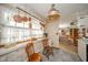 Cozy breakfast nook with window and vintage decor for a relaxing dining experience at 5939 Olivia Dr, Alexandria, IN 46001