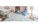 Comfortable living room showcasing ample natural light and views of other rooms in the home at 5939 Olivia Dr, Alexandria, IN 46001