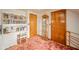 Room with a desk, chair, bookshelf, cabinet, and carpet at 5939 Olivia Dr, Alexandria, IN 46001