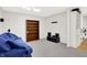 Finished basement offering comfortable seating and a built-in bookshelf at 5953 Deer Hollow Ct, Pittsboro, IN 46167