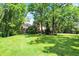 Beautiful home with a large, well-manicured lawn and mature trees, offering privacy and a serene setting at 5953 Deer Hollow Ct, Pittsboro, IN 46167