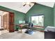 Cozy office space with natural light, desk setup, and a printer for an efficient work-from-home environment at 5953 Deer Hollow Ct, Pittsboro, IN 46167