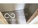 Unfinished basement floor with exposed framing and utility access at 609 E 37Th St, Indianapolis, IN 46205