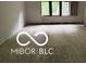 Living room displays natural light from the windows ready to design to your style at 609 E 37Th St, Indianapolis, IN 46205