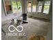 Spacious living room with natural light, awaiting final touches and personalization at 609 E 37Th St, Indianapolis, IN 46205