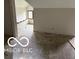 A bright open room awaits new carpet and personal finishes with natural lighting from the window at 609 E 37Th St, Indianapolis, IN 46205