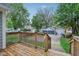 View from wood deck overlooking a yard with nearby garages at 617 N Dearborn St, Indianapolis, IN 46201