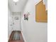 Hallway has a door to the outside, a coat rack, and natural light at 617 N Dearborn St, Indianapolis, IN 46201