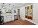 Beautifully remodeled kitchen boasting stainless steel appliances and views into the living room at 617 N Dearborn St, Indianapolis, IN 46201