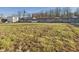 Expansive backyard featuring a lush lawn and sturdy wooden fence at 619 Belzer Dr, Anderson, IN 46011
