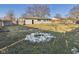 Large backyard featuring a fire pit perfect for outdoor gatherings at 619 Belzer Dr, Anderson, IN 46011