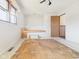 Bedroom featuring a window, ceiling fan, and space for customization at 619 Belzer Dr, Anderson, IN 46011
