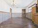 Bright dining room featuring hardwood floors and seamless transition to the kitchen at 619 Belzer Dr, Anderson, IN 46011
