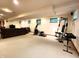 Spacious finished basement features carpeted floors, an exercise area and ample space for entertaining and relaxation at 6190 Red Day Rd, Martinsville, IN 46151