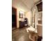 Bathroom features vinyl flooring, a glass enclosed shower, and a single sink vanity at 6190 Red Day Rd, Martinsville, IN 46151