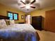 Tranquil bedroom features plush queen bed, natural light, and ample closet space at 6190 Red Day Rd, Martinsville, IN 46151