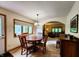 Cozy dining room features wood table and seating for four, open to living room at 6190 Red Day Rd, Martinsville, IN 46151