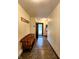 Hallway with tile flooring and a wooden bench at 6190 Red Day Rd, Martinsville, IN 46151