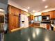 Eat-in kitchen boasts oak cabinets and countertop seating at 6190 Red Day Rd, Martinsville, IN 46151