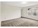 Bedroom featuring neutral carpet and a double window bringing in plenty of natural light at 630 Harmony Way, Greenwood, IN 46143