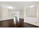 Spacious open-concept living area with hardwood floors and abundant natural light at 630 Harmony Way, Greenwood, IN 46143