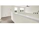 Loft with carpet and two windows, allowing for lots of natural light at 630 Harmony Way, Greenwood, IN 46143