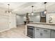 Finished basement with a bar area, a pool table, neutral paint, and carpeted stairs leading to the upper level at 644 Ridge Gate Dr, Brownsburg, IN 46112
