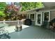 Relaxing deck with outdoor seating, modern grill and easy backyard access at 6550 Sunset Ln, Indianapolis, IN 46260