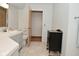 Renovated bathroom with corner sink, tiled floor and separate toilet room at 6550 Sunset Ln, Indianapolis, IN 46260