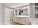 Bright bathroom with dual vanity, walk-in shower, and a separate soaking tub at 8338 Hunters Meadow Way, Indianapolis, IN 46259