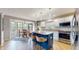 Modern kitchen with white cabinets, stainless steel appliances, and a breakfast nook at 8338 Hunters Meadow Way, Indianapolis, IN 46259