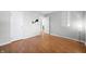 Bedroom with hardwood floors, closet, and doors at 8416 Buckingham Dr, Columbus, IN 47201