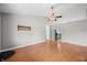 Spacious living room with hardwood floors and bright, natural light at 8416 Buckingham Dr, Columbus, IN 47201