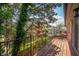Balcony overlooking green foliage and a neighboring brick building at 8503 Canterbury W Sq # D, Indianapolis, IN 46260