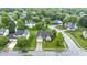 Charming brick home with attached garage, landscaped front yard, and inviting entryway at 8599 Lansdowne Dr, Fishers, IN 46038