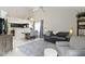 Inviting living room featuring an open floor plan, vaulted ceilings, and stylish decor at 8599 Lansdowne Dr, Fishers, IN 46038