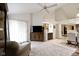 Bright living room boasting lots of natural light, a TV and open floor plan at 8599 Lansdowne Dr, Fishers, IN 46038