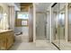 This bathroom features a combined bathtub and shower, vanity, and large mirrored shower at 8599 Lansdowne Dr, Fishers, IN 46038